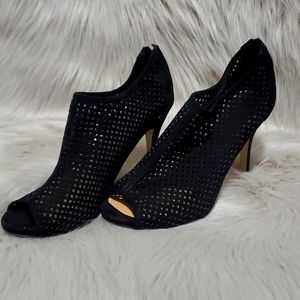 Black toe-out, shoe booties by Madden Girl